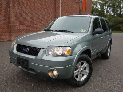 Ford escape hybrid 4wd heated leather navigation sunroof new tires no reserve