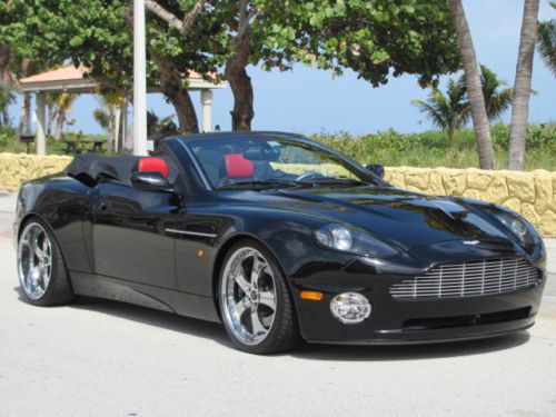Convertible! black / red, only 18k miles! custom sound and wheels too! unique!