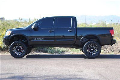 Lifted 2010 nissan titan crew cab pro x 4...lifted nissan titan crew cab ..prox4