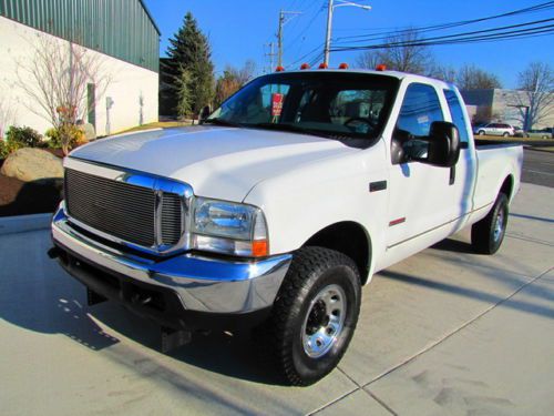 Turbo diesel !lifted 4x4! long bed  ! low mileage! no reserve ! ready to work!03
