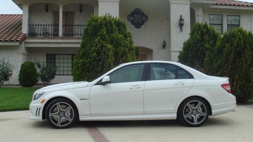 Mercedes benz c-63 amg, 411 miles on odometer, one owner