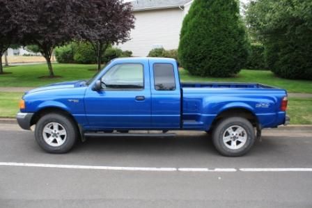 2002 blue ford ranger xlt, v6, 4x4,super cab, sidestep bed, tow package