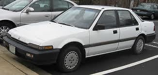 White, 1989 honda accord dx, automatic with maroon interior.  69,000 miles clean