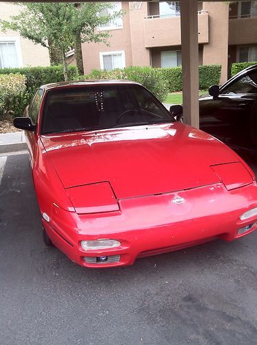 Red s13 coupe automatic. 17" rims. lowered.