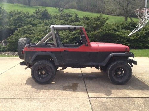 1989 jeep wrangler (red, newer engine, decent condition)