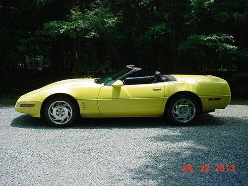 1991 yellow corvette 6spd conv. black leather. 140k. cheap. no reserve.