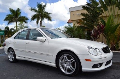 C55 amg navigation sunroof cd changer hids heated leather carfax certified 67k