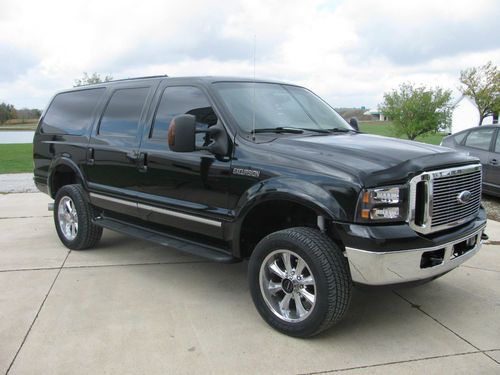 2004 ford excursion 4x4 diesel with ton's of ad ones !!! one of a kind look!!