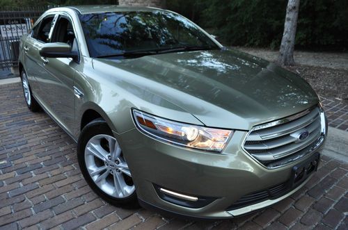2013 taurus sel 4x4.no reserve.awd.leather/navigation/sync/snsrs/salvage/rebuilt