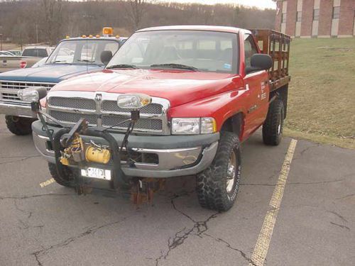 Dodge ram stake body truck with snow plow t-44
