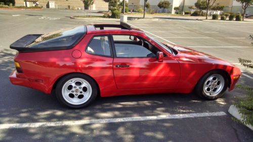 944 early 1985, new red paint, great condition, 2 door coupe. rebuild car.