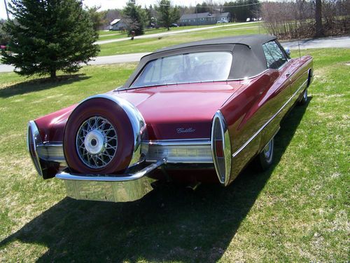 1967 cadillac conv. red and black top