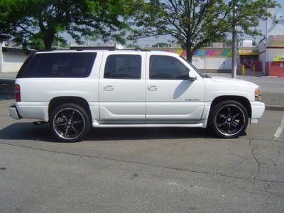 Custom gmc denali tinted windows 24 inch foose rims and tires looks amazing