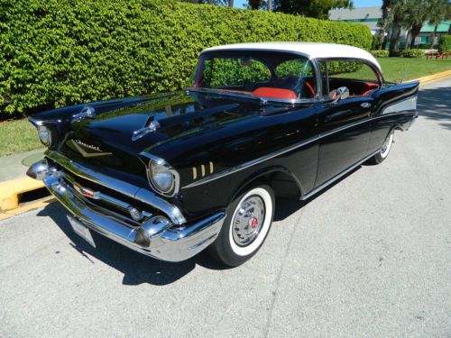 1957 chevrolet chevy bel air  hardtop 283 dual quad 2x4 3 on the tree manual