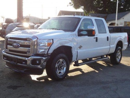 2011 ford f-250 sd xlt crew cab 4wd damaged fixer runs! low miles diesel powered
