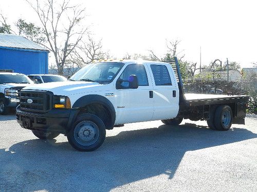 2007 ford f550 4x4 10' 6"  flat bed crew cab dually power stroke diesel 6 speed