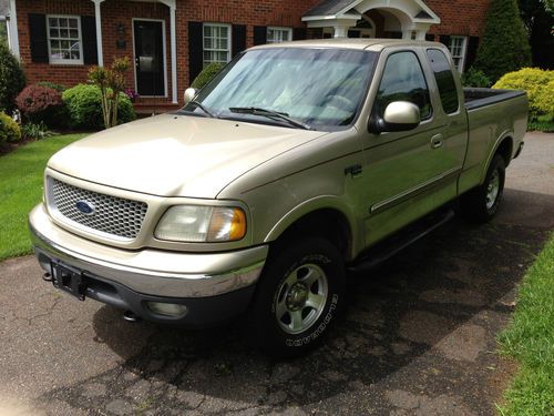 1999 ford f150 lariat super cab, tan, 1 owner, 4wd, good condition