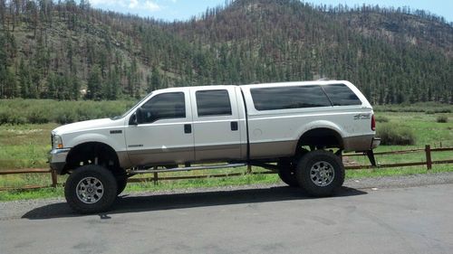 02 f350 crew cab long bed 4x4 7.3l diesel lifted