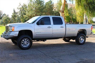 Lifted long bed motometal wheels rancho lift custom road armor bumpers and winch