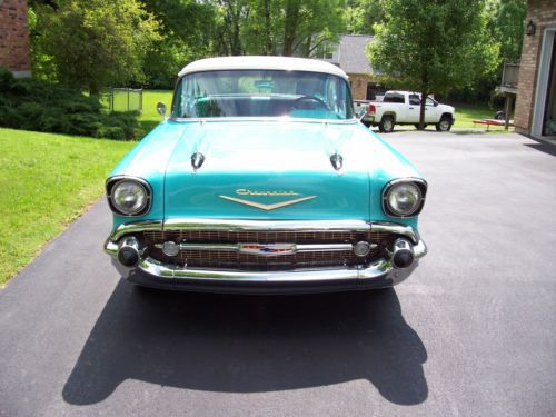 1957 chevy belair  dr.ht.   turquoise with white top