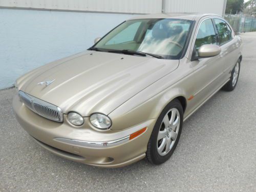 2004 jaguar x type  moonroof low miles  heated seats clean carfax   very sharp