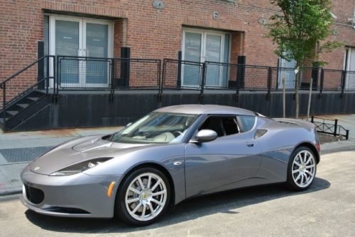 Like new. only 880 miles. 2011 lotus evora 2+2 manual in grey w/a black interior