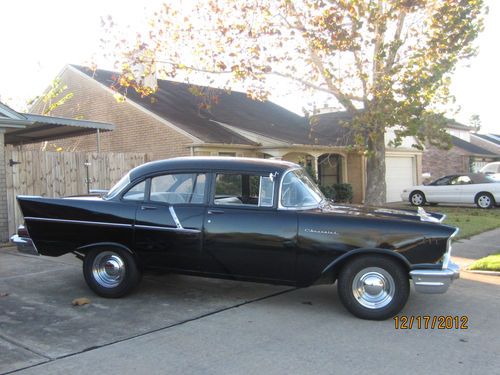 1957 chevy 4 door 210,blk, good condition, runs &amp; drives great, very little rust