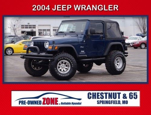 Blue, 4wd, lifted, over sized tires, inline v6, soft top, carfax available
