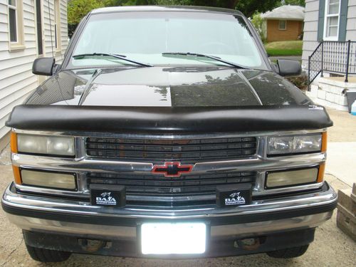 1998 chevrolet silverado k-1500 extended cab 4-wd with topper.