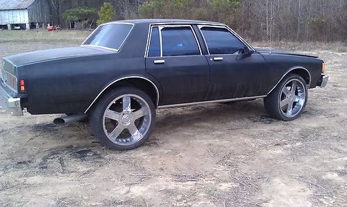 1986 chevy caprice donk on 24 s player rims