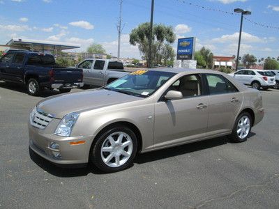 2005 gold v6 leather automatic miles:79k 4-door