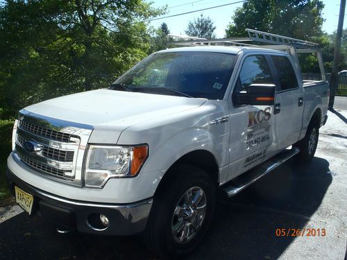 White 2013 f150 4x4 crew cab with ladders racks, 5 1/2' bed, very low mileage