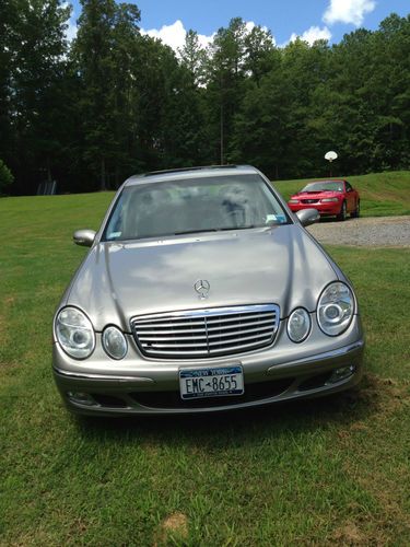 Excellent condition, pewter,7 disc cd player,sunroof, black leather, lcd screen,