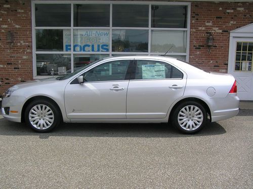 Brand new! 2012 ford fusion hybrid. brand new! full factory warranty brand new !