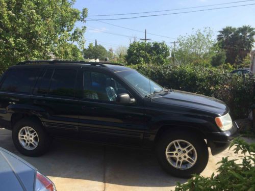 2000 jeep grand cherokee limited  v8 tow, sunroof, tinted windows, very clean