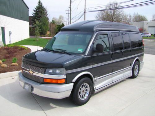 Great luxury high top conversion limited explorer  awd  7  passenger  van! 04