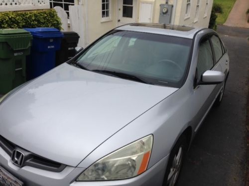 2005 honda accord with only 38000 miles! silver with black leather interior.