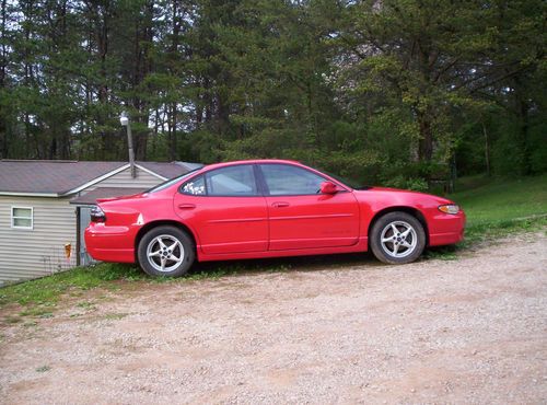 2001 pontiac grand prix, red, 4 door, has fire damage