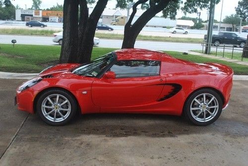 2009 lotus elise 190 red/tan 3200 miles!! nice!