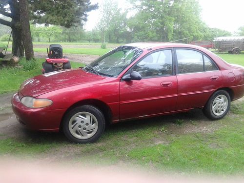 1997 ford escort lx sedan 4-door 2.0l "rusty but trusty"