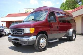 Very nice, raised roof, dual rear wheel,10 or 13 pass., with tv / dvd system!