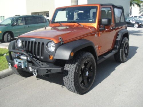 2011 wrangler sport gold ,trail ready ,over size tires !