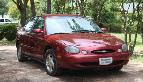 99 ford taurus ruby red in great condition - no reserve