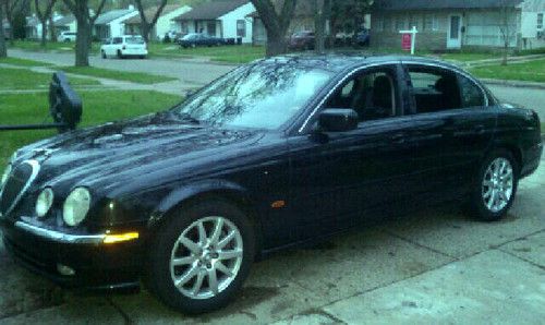 Black on black, new tires, new brakes, navigation, run's &amp; drive's great