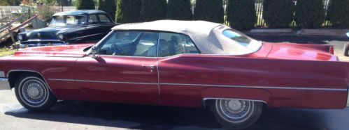 1969 cadillac deville. maroon w/ white interior 69k **must see** convertable