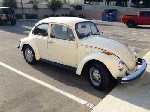 74 volkswagen beetle sedan white original paint, upholstery. not a restoration.