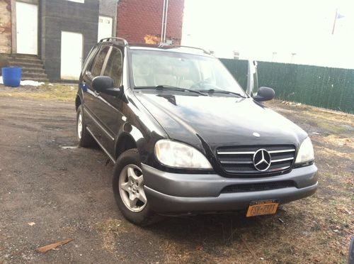 Ml 320 benz very clean car with smooth driving awd clean title