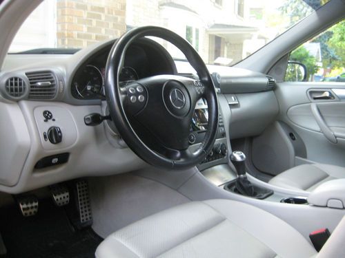2006  benz  c230  six speed stick shift!   low 52k  miles  clean in &amp; out.
