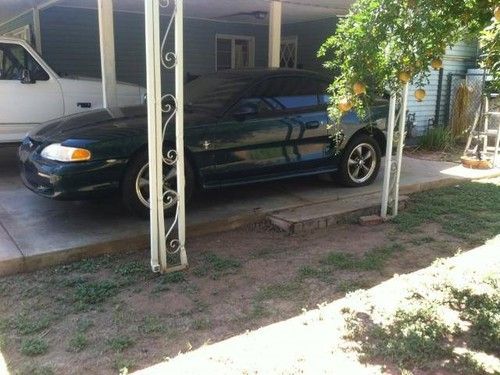 Green 1997 ford mustang 2 door coupe