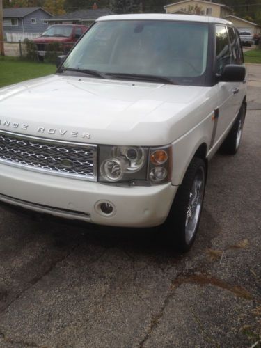 Clean white range rover